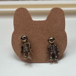 Skeleton stud earrings